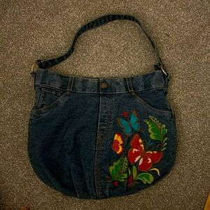 Patricia Nash denim butterfly purse, back pockets, beautiful butterfly design